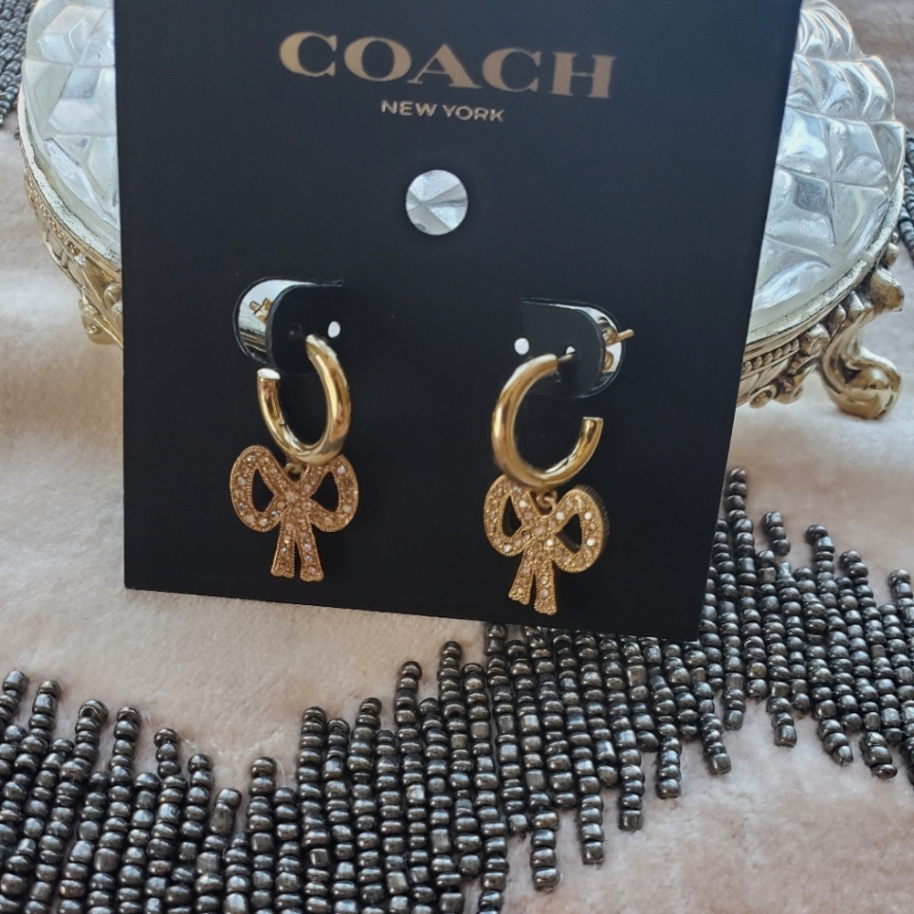 Coach gold bow Earrings.